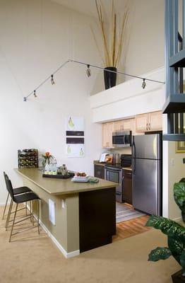 Amazing lofts with stainless appliances and 2-tone maple cabinets