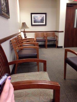 Sitting in the waiting room.