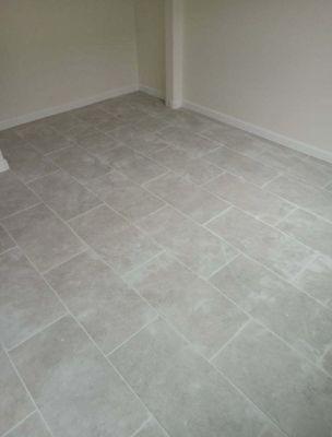 Area of the house after tile, paint, and baseboards.