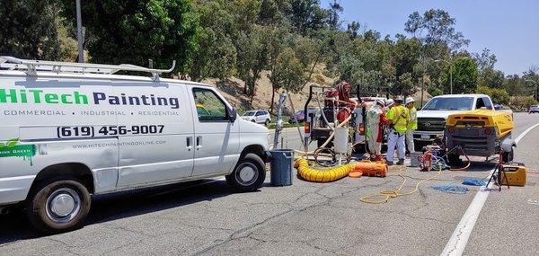 Manhole Work on a busy surface street