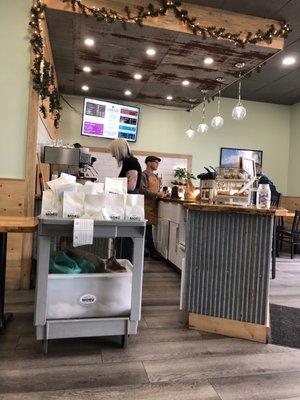 Barista bar - with packaged coffee beans in the foreground