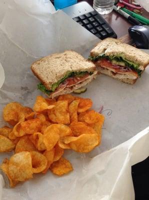 Turkey bacon on wheat with lettuce, tomato, onions, pickles, and mayo!