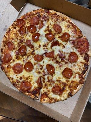 Pepperoni pizza on thin crust