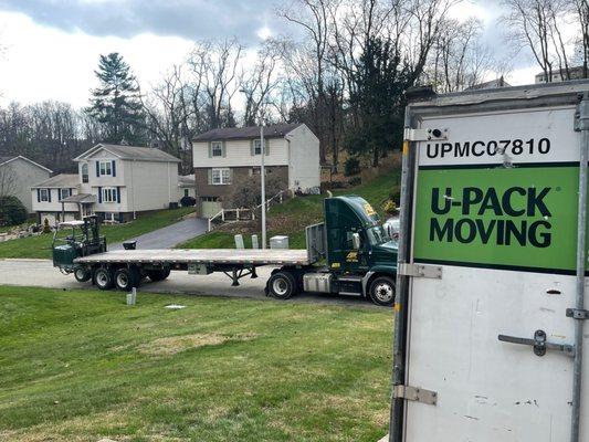 U-Pack truck coming to pick up my filled pod. (Pretty steep driveway that didn't cause any issues)