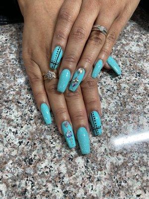 Full set with designs. I love my nails as always. NT is the person to see if you want fabulous nails!!!