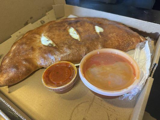 Sausage and green peppers calzone.