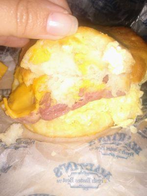 Ham, egg, and cheese biscuit interior. Not the best shot, but I was trying to fight my cat while taking this lol.