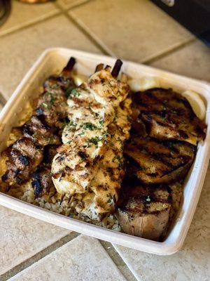 Family Style Mixed Grill with extra chicken skewers.