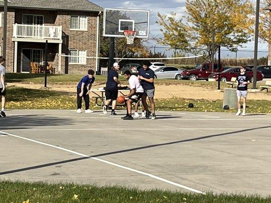 Getting in a game of basketball.