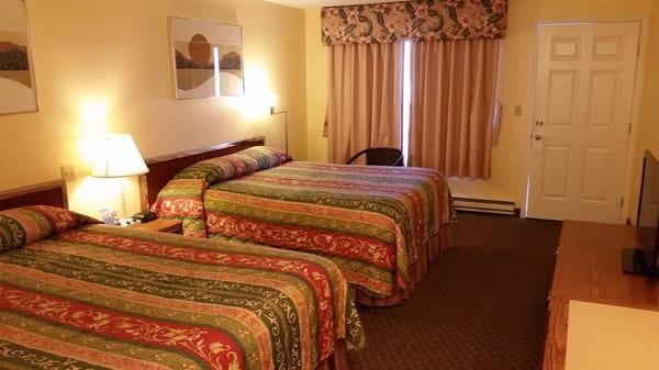 Two queens for 65 plus 10 pet fee. Clean and plenty of room with a mini fridge & microwave.