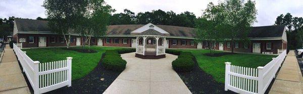 This is the building we are located in. In this picture it is the door all the way on the right.