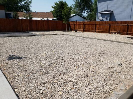 the curb will help separate the rock from the artificial grass that will go in the middle.