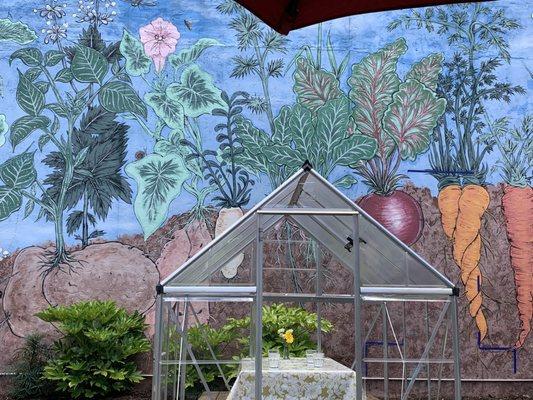 Mural outside and greenhouse dining