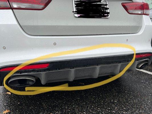 The under bumper piece is missing a chrome ribbon.