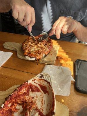 Lasagna and (eaten) meatball appetizer.