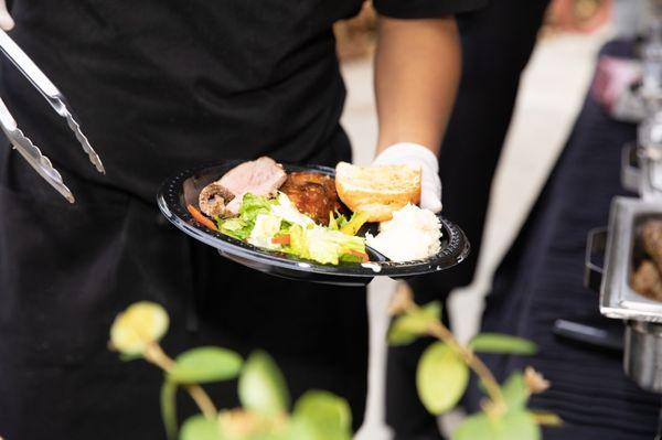 Tri tip, BBQ chicken, mashed potatoes, salad, garlic bread