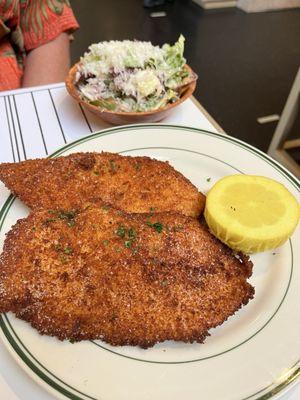 Chicken Cutlet, lemon & chicory side salad.