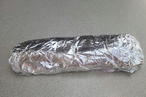 Juanita sells each burrito for $3, and they come nice and hot, fresh, and wrapped in foil.