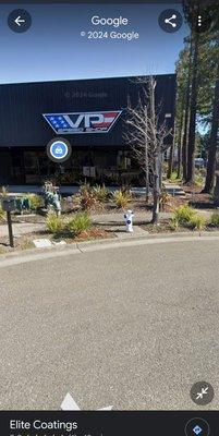 When you see the VP sign, turn left then turn right and drive down to the end of the building. Elite Coatings is at the far end.