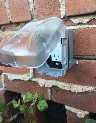 Outdoor socket with new cover.