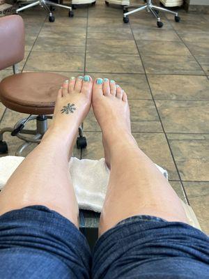 Gel with Chrome polish. My feet feel amazing!