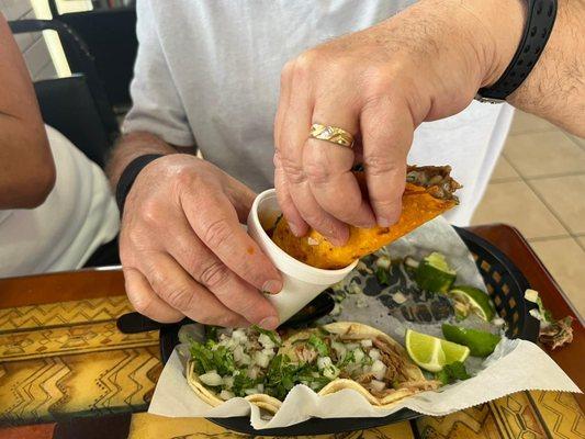 Food- Birria ( beef) dipped in consume