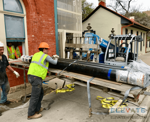 Removing old equipment and extending elevator to roof top!