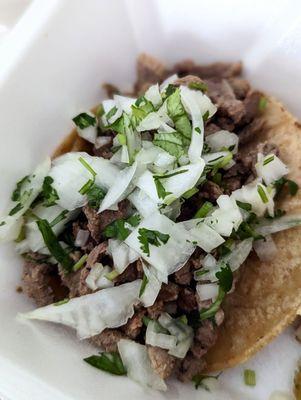 Mini taco with carne asada. They do not hold back on the meat, yassss