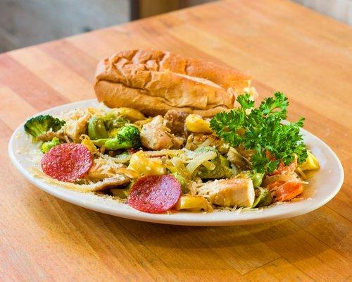 (Tuscany Pasta On Tri-Color Tortellini)  Garlic Butter Sauce With Onion, Chicken, Sausage, Pepperoni, Mushroom, Broccoli, Parmesan Cheese.