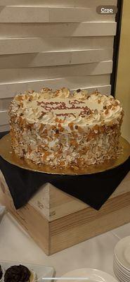 Italian wedding cake created as a birthday cake. Shaved almond and apricot, pure perfection.