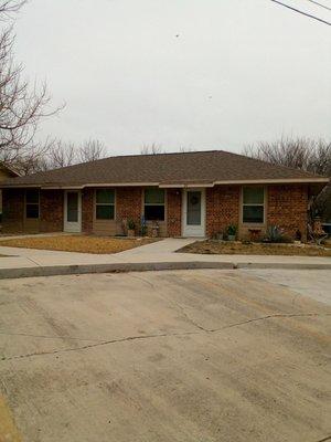 Another sampling of the duplex unit. Make the front your own! As you can see the resident on the right has a beautiful yard.