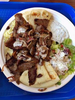 Beef & lamb gyro plate. Meat with sautéed onions and creamy drizzle! This hit the spot!