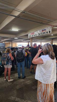 Upset people waiting for their Budget Rent a car