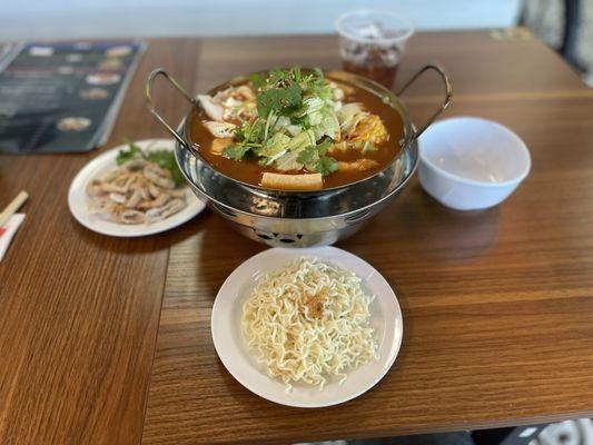 HOT POT selection  tomato, pork belly, intestines with instant noodles . Comes with sweet tea.