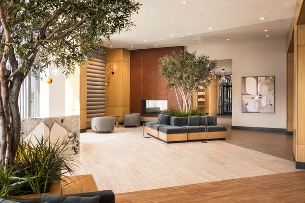 Expansive lobby with trees and seating areas