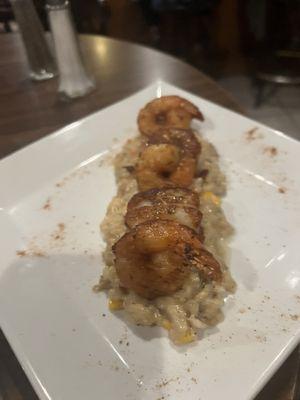 Shrimp and scallops over risotto