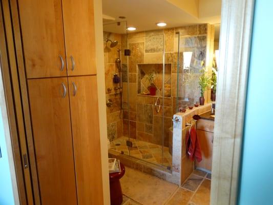 master bath in 2 bedroom condo.
 Moved some walls, removed the tub, installed walk in shower with corner seat and body sprays