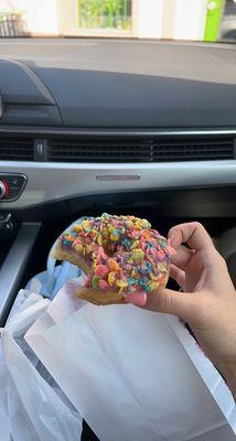 fruity pebble donut with berry glaze