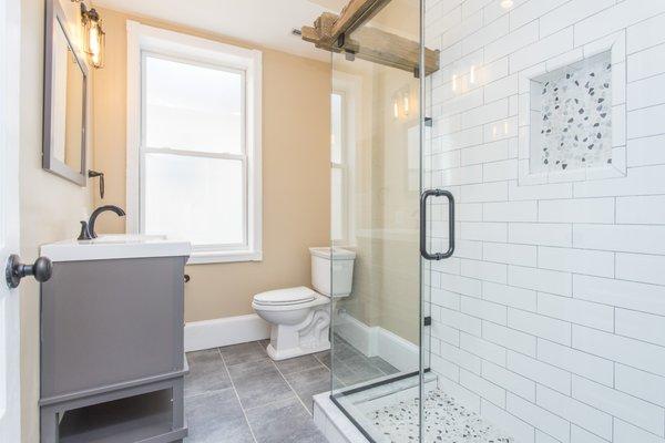 bathroom remodel with custom original hand hewn barn beams