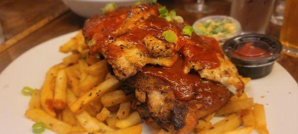 Special of the day: ribs and grilled chicken over a bed of fries, with a side of kale and brussels salad.