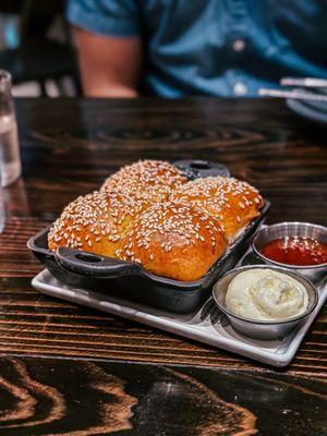 Bread Service / Annatto Sesame Rolls with Cultured Butter and Shellfish Pepper Jam