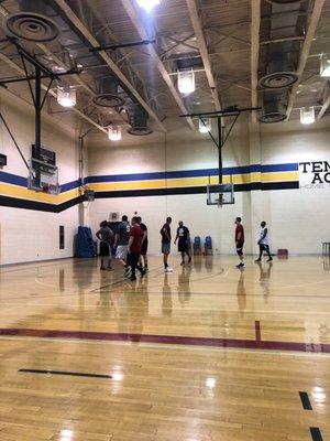 Men playing basketball.