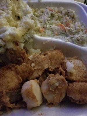 This is the scallops i ordered supposed to be fried all the breading was in the container with puddle of grease and they were overcooked.