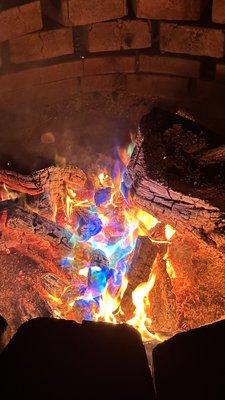 Enjoying the fire pit. Someone brought something that makes the fire rainbow colors. Pretty cool touch (we did this after the s'mores)