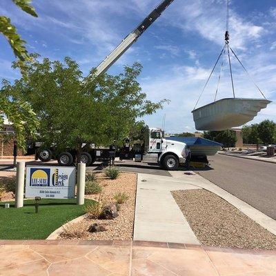 New fiberglass pool being delivered.