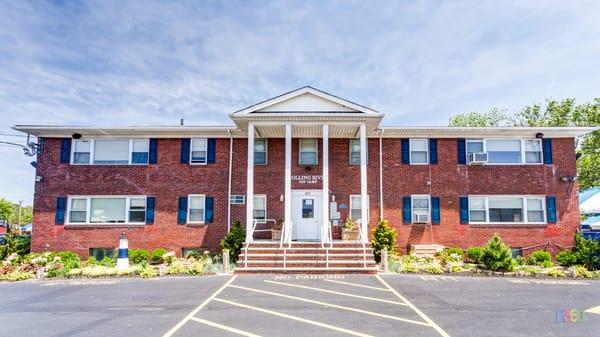 Main facility entrance, offices, home base classrooms for ages 2 to 5