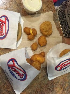 Kid's meal - chicken nuggets with cheese curds. Cookie for dessert.