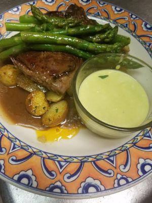 new year "special"  filet mignon with asparagus and roasted potatoes topped with a light delicious brown beef sauce. 
HAPPY HOLIDAYS