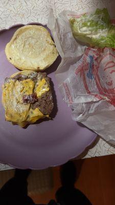 Smallest and only piece of bacon on this jr. Bacon cheeseburger.