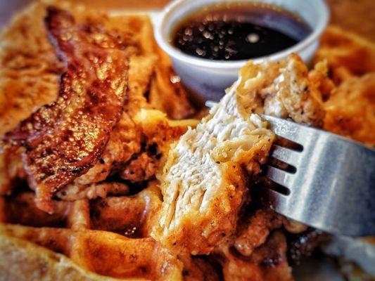 Perfection bundled. Waffles, Fried Chicken, Maple Bacon & warm Maple Syrup.